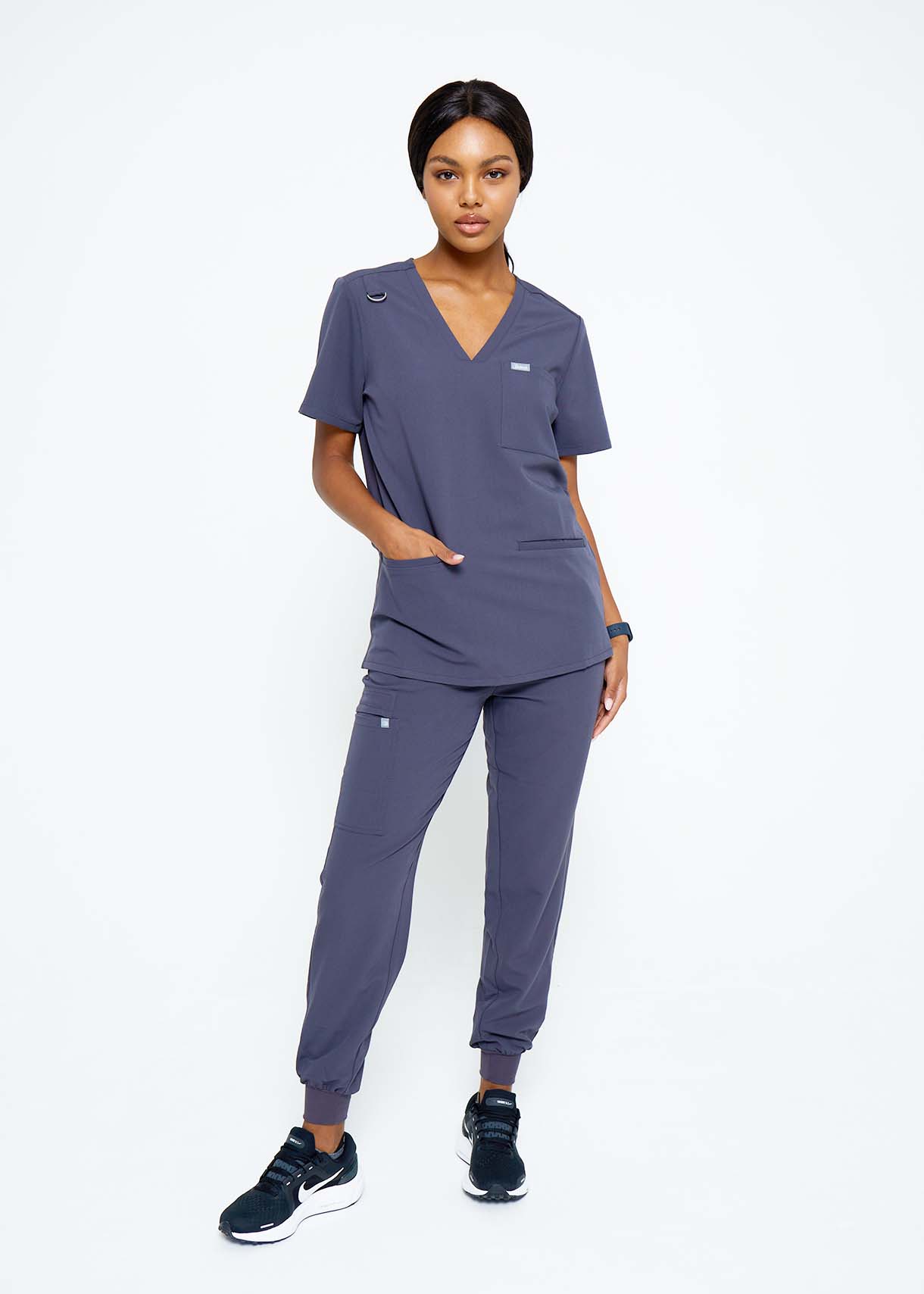 Model wearing scrubs.