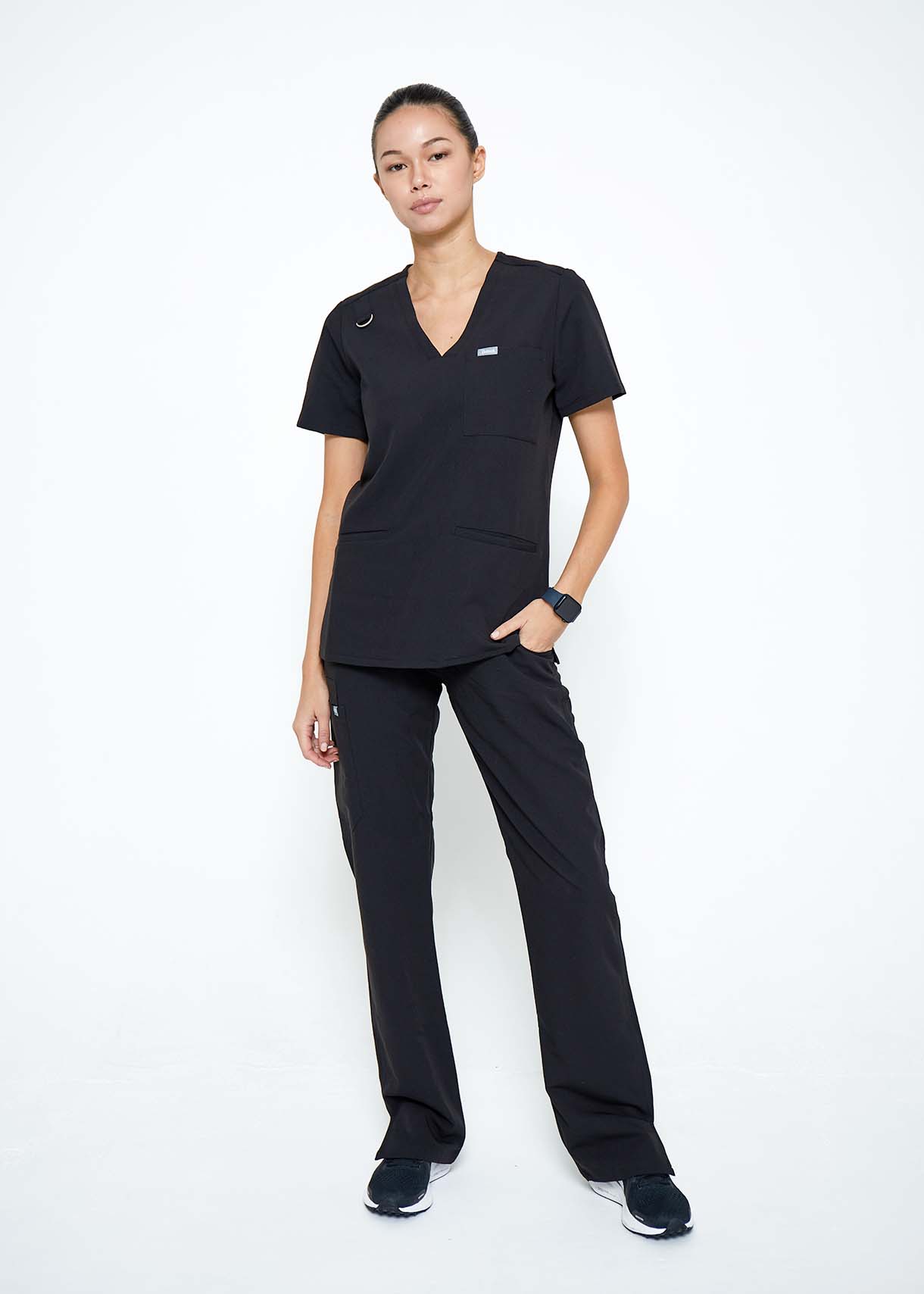 Model wearing scrubs.