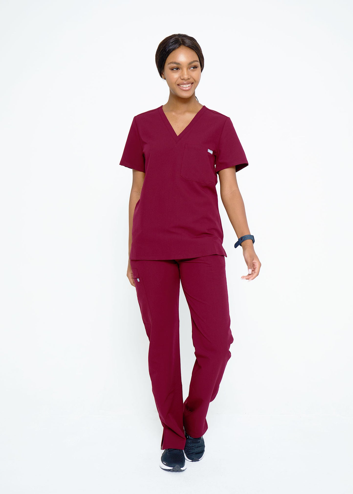 Model wearing scrubs.