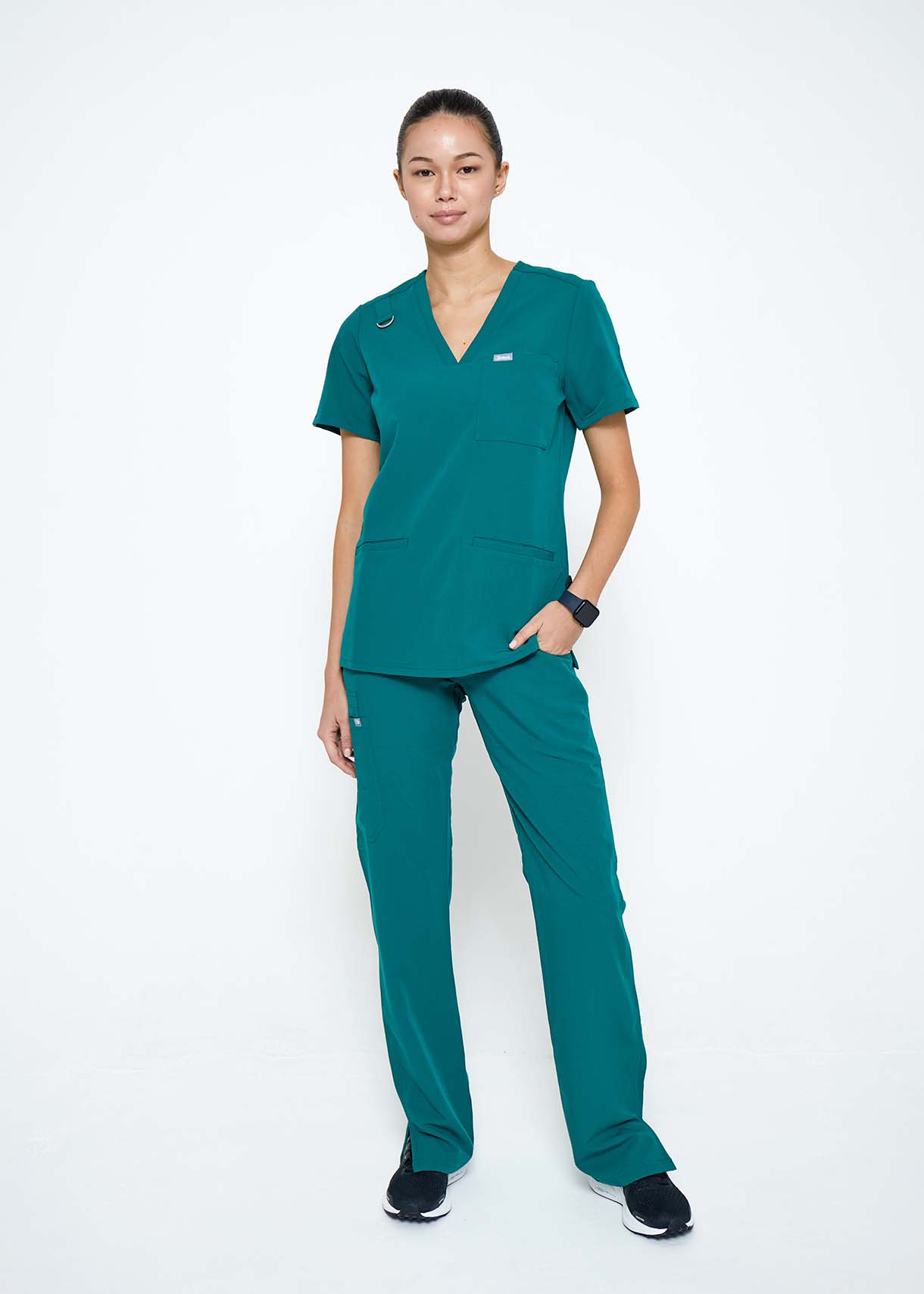 Model wearing scrubs.